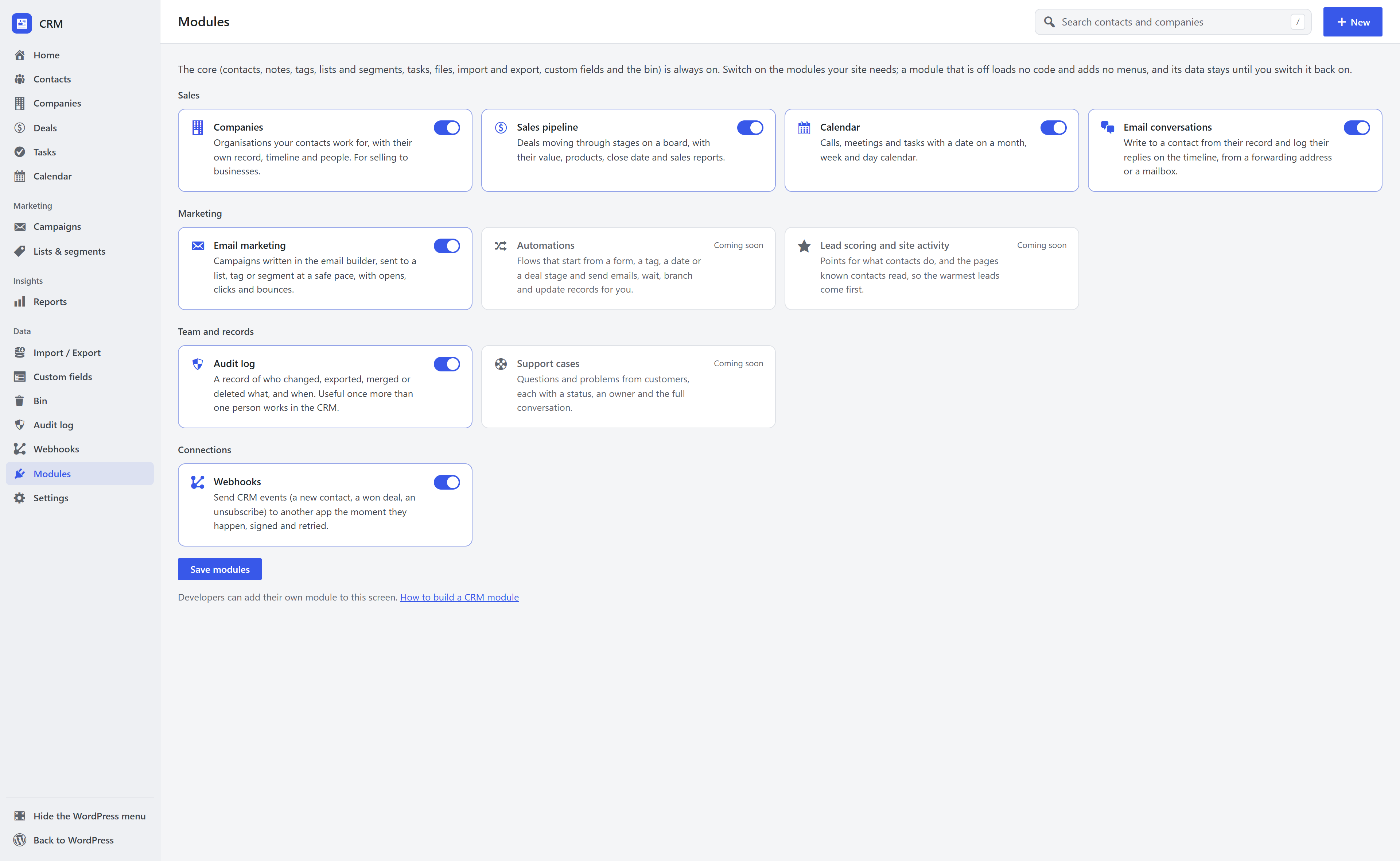 The CRM Modules screen: cards for Companies, Sales pipeline, Calendar, Email conversations, Email marketing, Audit log and Webhooks, each with a switch