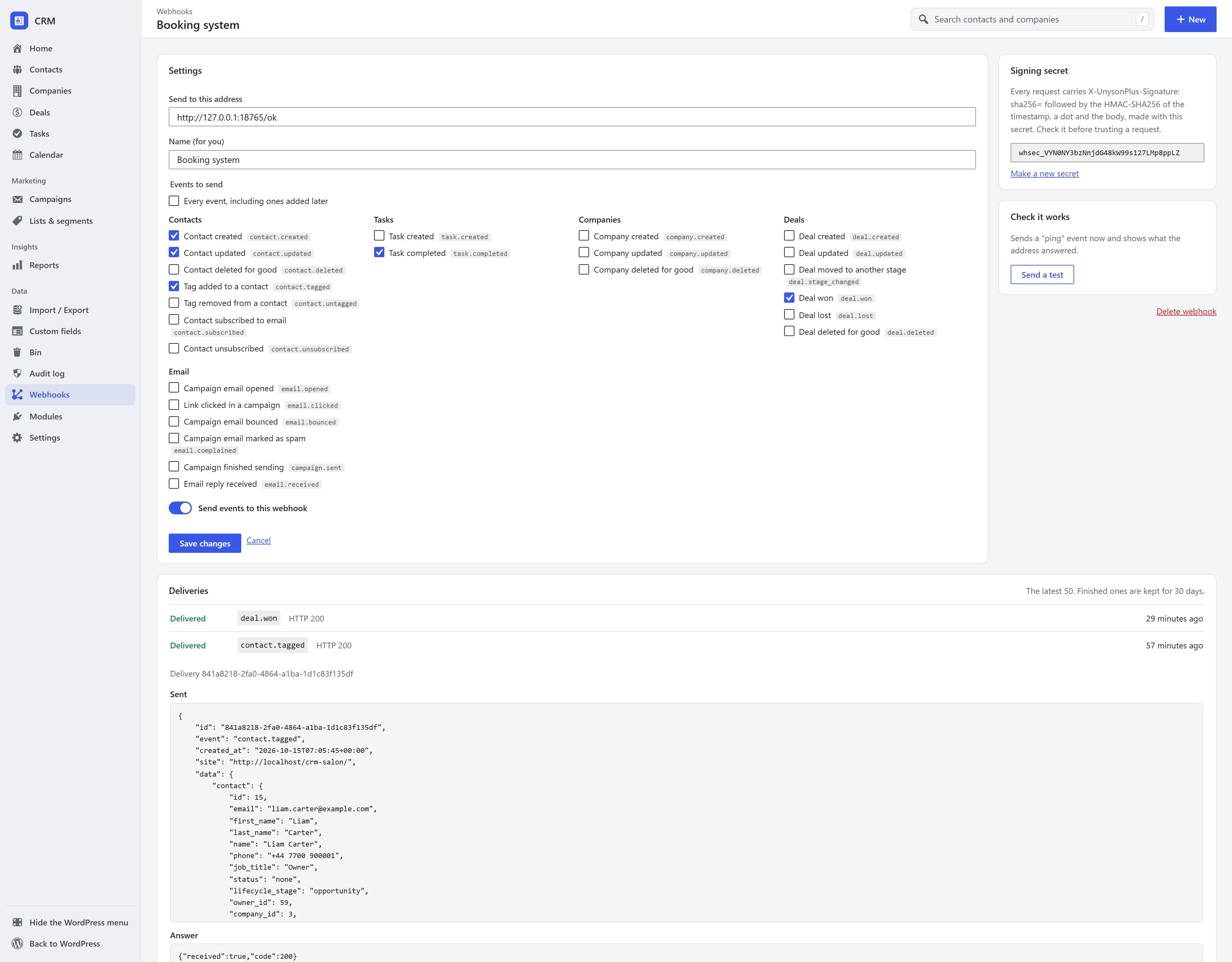 Editing a CRM webhook: address, events, the signing secret, Send a test and the delivery log