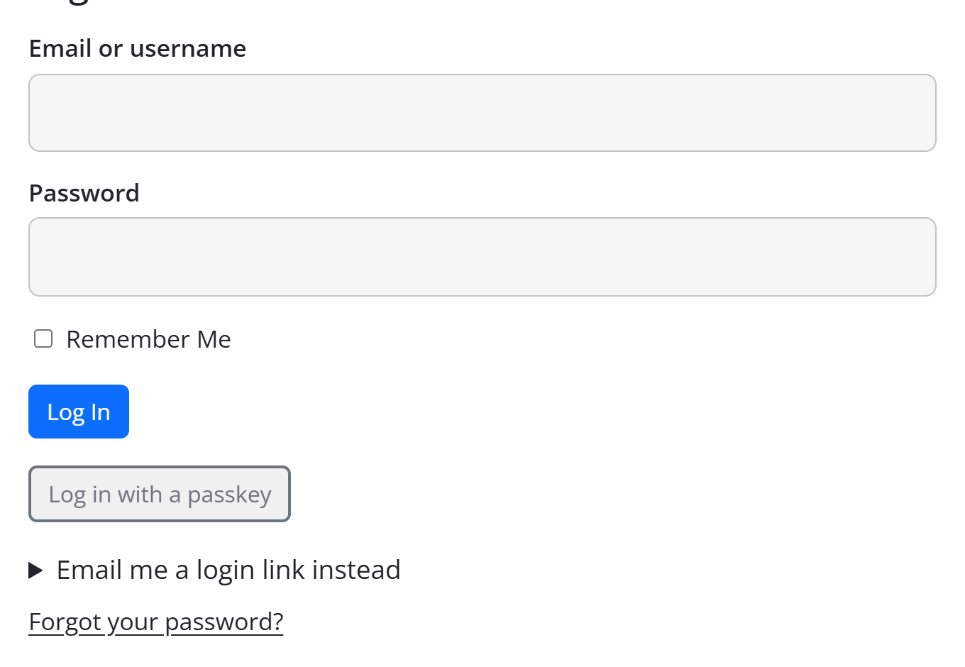 The Member Login element on the front end: email or username, password, Remember Me, Log In, Log in with a passkey, Email me a login link instead and Forgot your password?